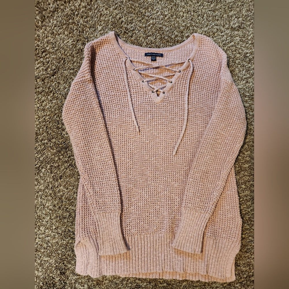 Small pink sweater